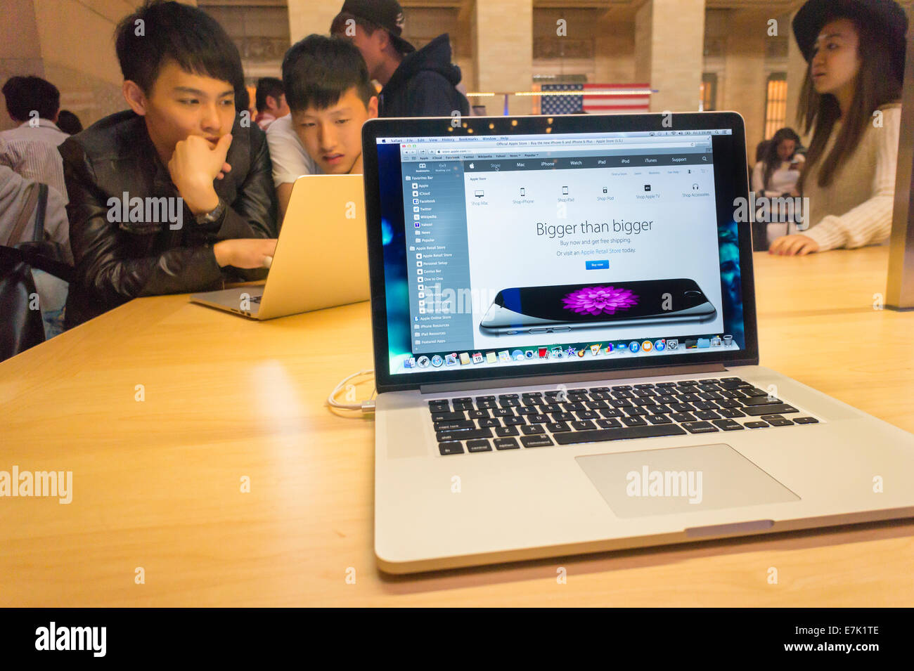 A Customer at an Apple Store Looking at His IPhone while Waiting at an Apple  Store Editorial Photo - Image of imac, computer: 237668441