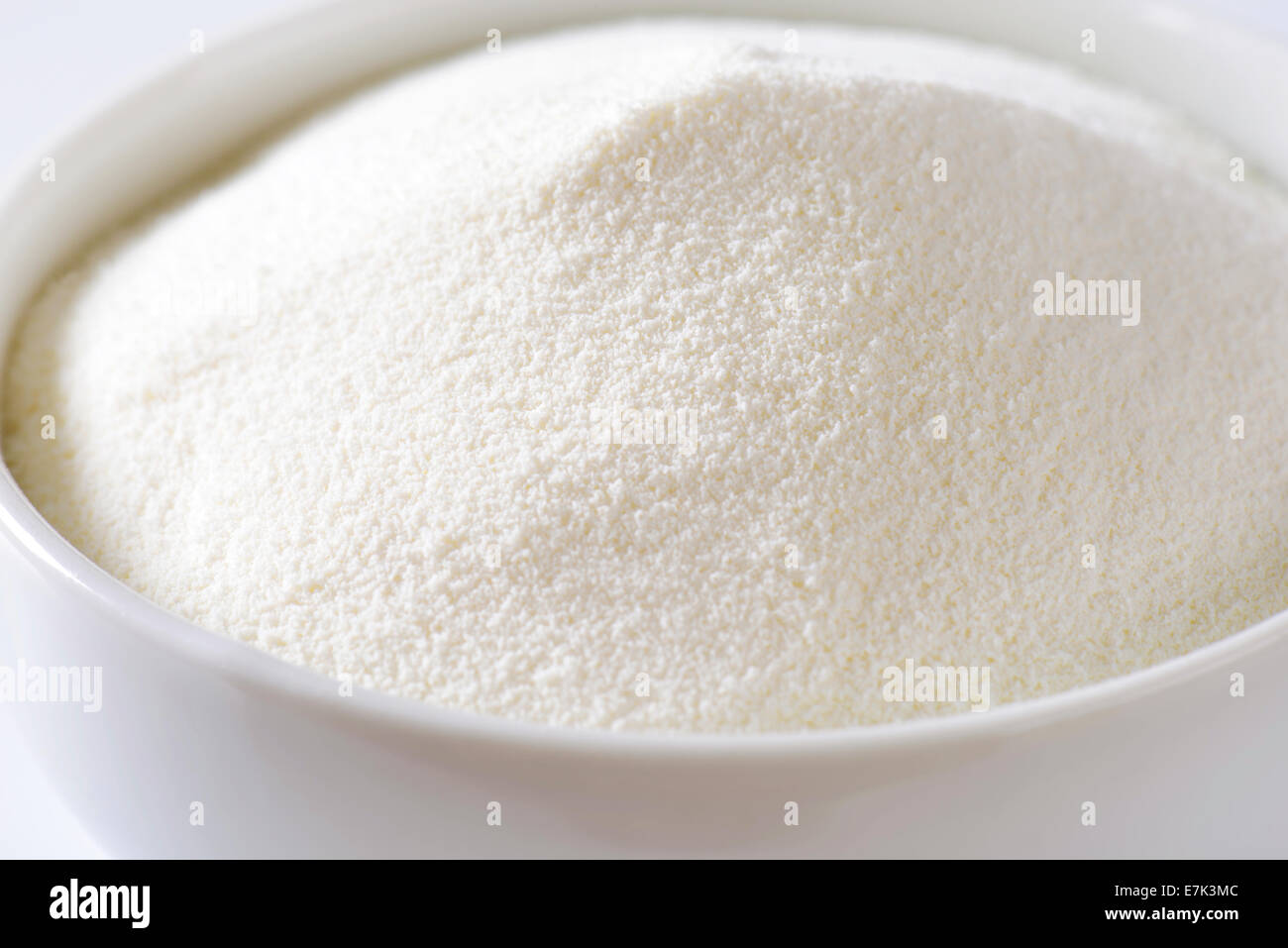 Bowl of full cream powdered milk Stock Photo - Alamy