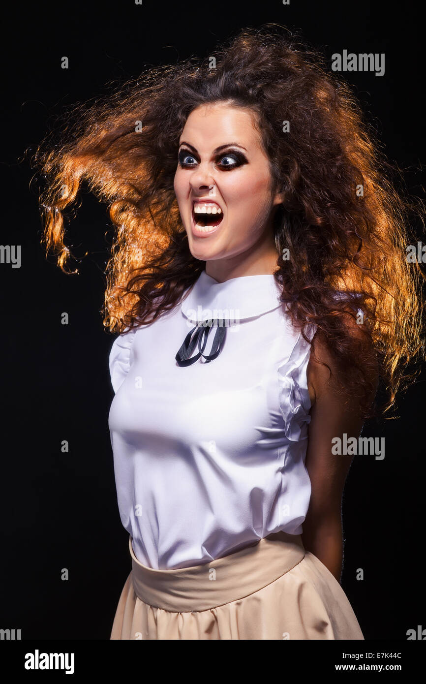 angry screaming crazy woman in dark Stock Photo Alamy