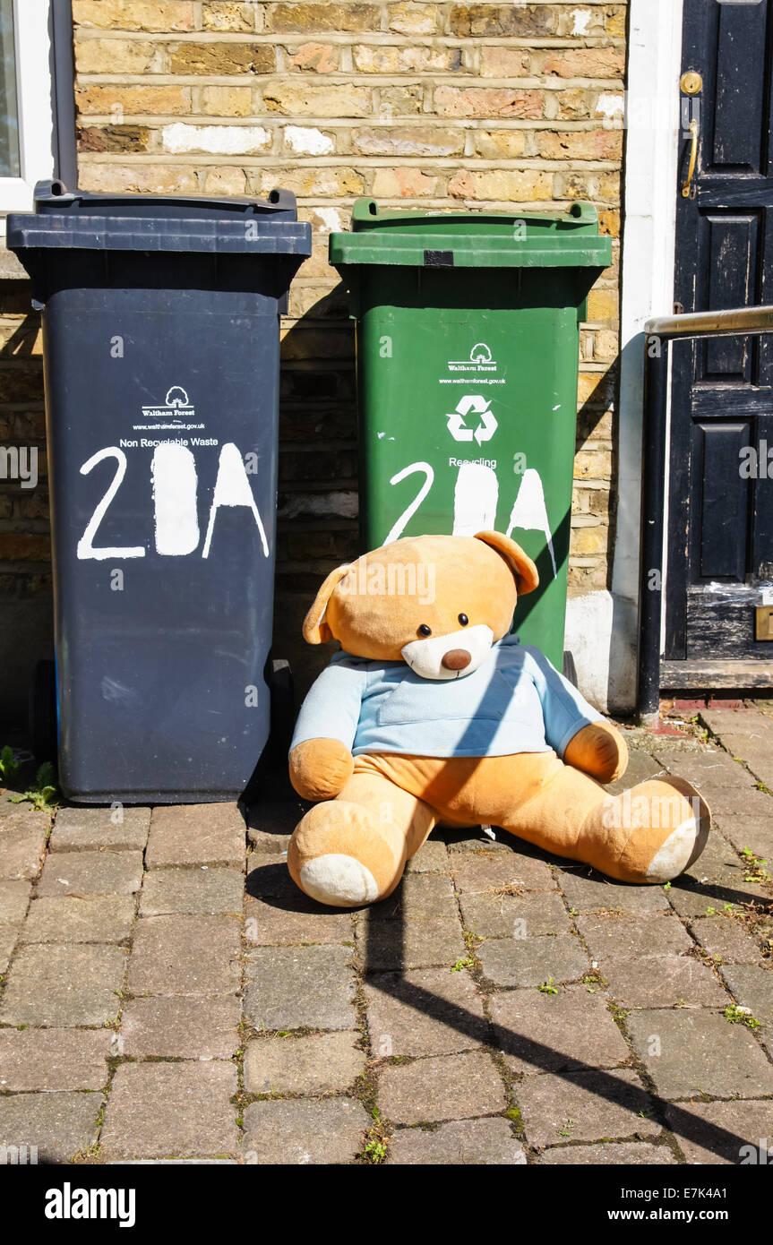 Trash waste rubbish outside a house waiting for collection London England United Kingdom UK