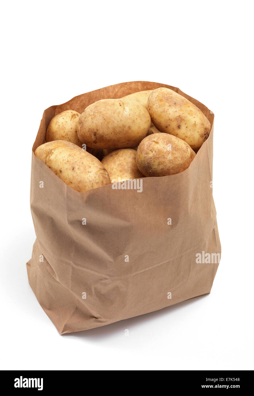 New potato in grocery bag Stock Photo
