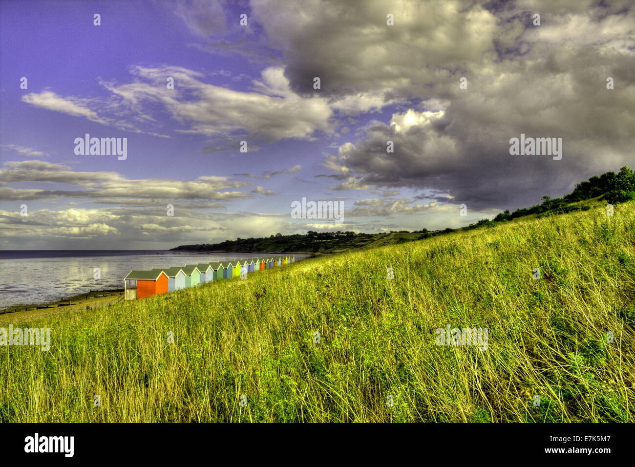Infrared image of Row of beach huts as seen from the headland at Minster on Sea in Kent, England UK Stock Photo