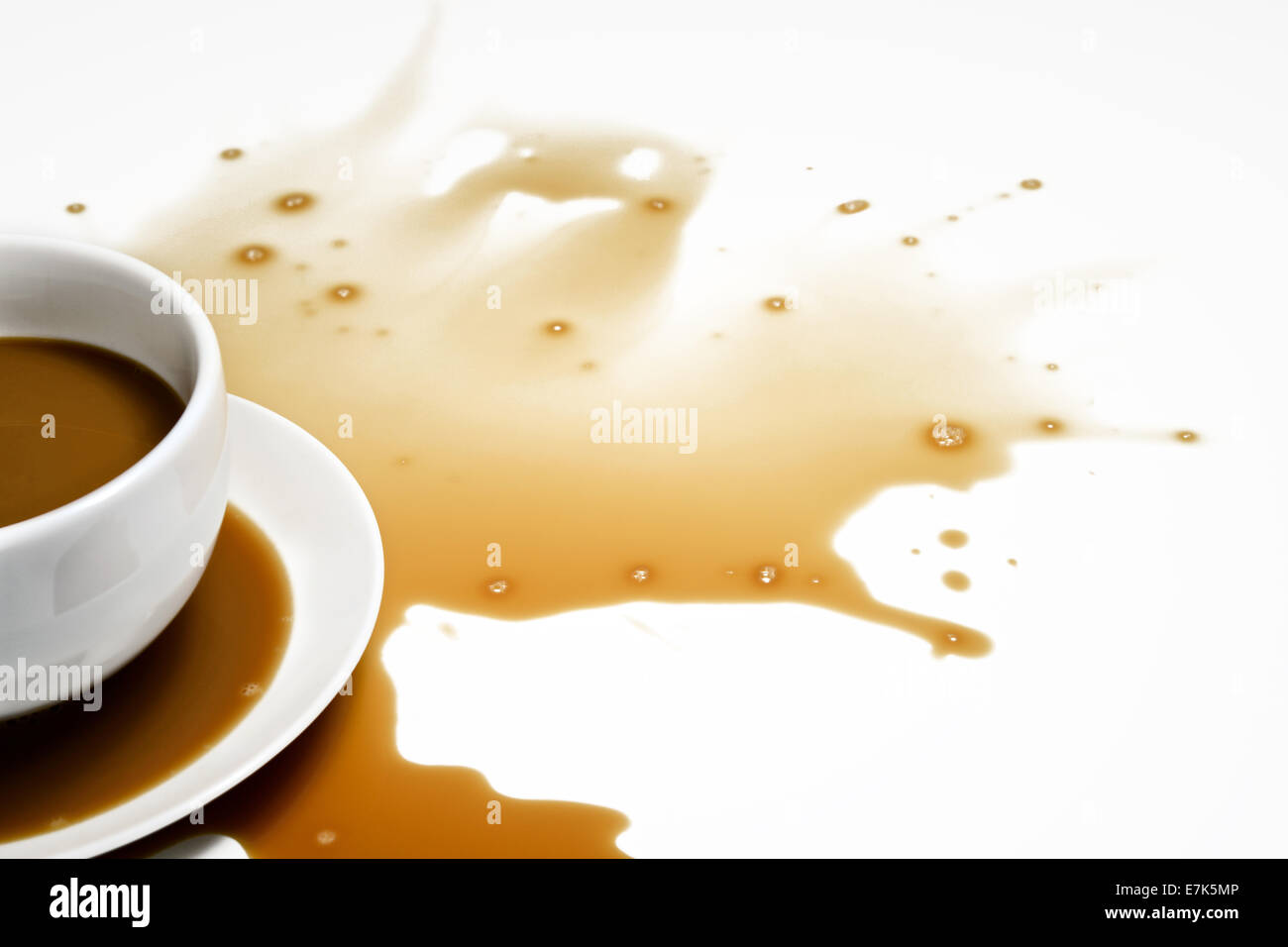 Spilled Coffee on White Desk Stock Photo Alamy