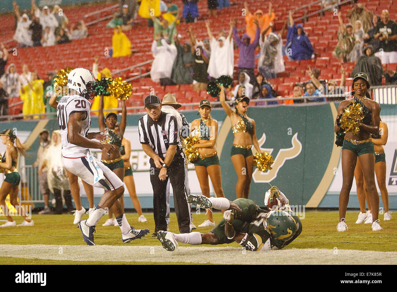 Sept. 19, 2014 - City, Florida, U.S. - OCTAVIO JONES | Times .South Florida Bulls wide receiver Rodney Adams (87) scores on a touchdown pass over Connecticut Huskies safety Obi Melifonwu (20) in the first quarter at Raymond James Stadium in Tampa on Friday, September 19, 2014. (Credit Image: © Octavio Jones/Tampa Bay Times/ZUMA Wire) Stock Photo