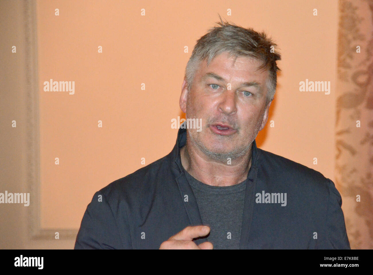 New York, USA. 19th Sep, 2014. US actor Alec Baldwin speaks during an interview in New York, USA, 19 September 2014. Baldwin plays a greedy manager in the TV show '30 Rock'. In his private life he is an advocate for clean energy. In an interview with dpa he talked about why he promotes renewable energy and why he adores Germany. Photo: Chris Melzer/dpa/Alamy Live News Stock Photo