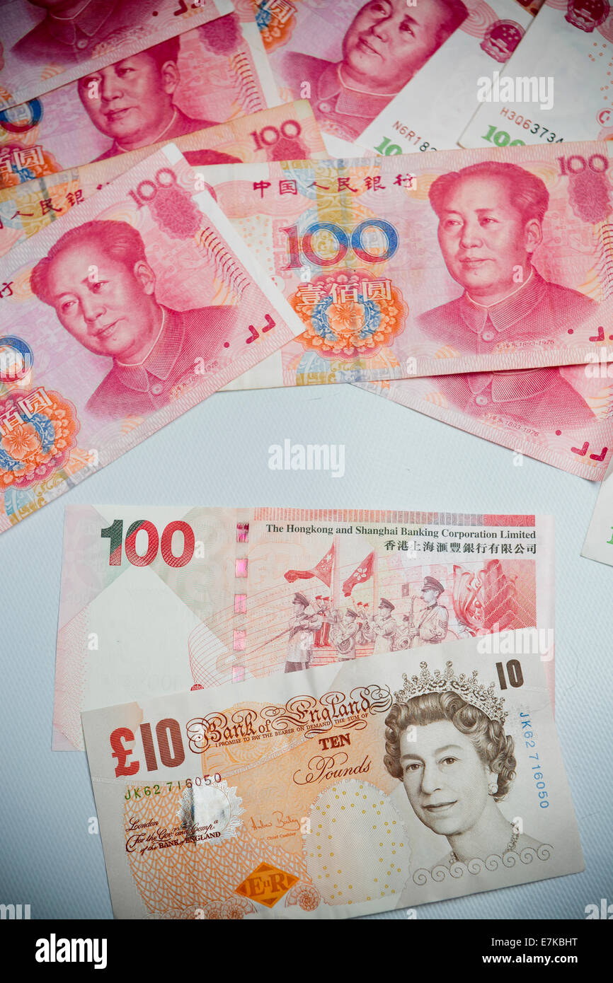Hong Kong Dollar Pound Sterling Renminbi Yuan money travel currency Hong Kong Empire trade embargo sovereignty wealth UK China globalisation Duty Tax Stock Photo