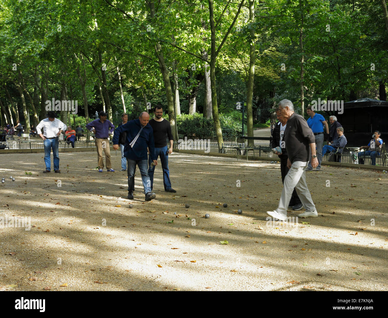 Men playing Boules (Petanque) in Jardin du Luxembourg, Paris. Stock Photo