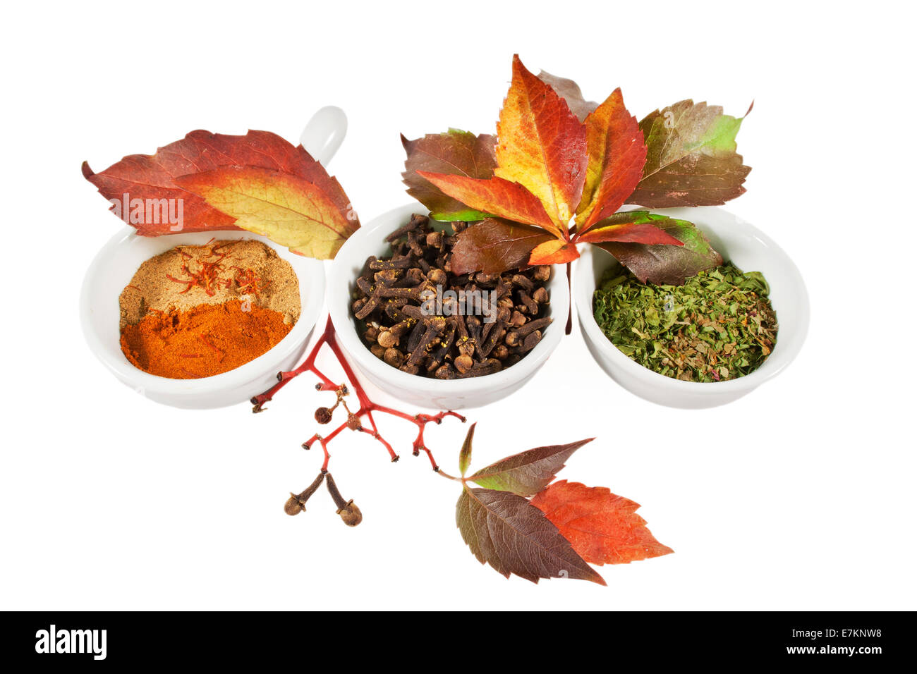 Autumn spices and leafs over white isolated background Stock Photo - Alamy