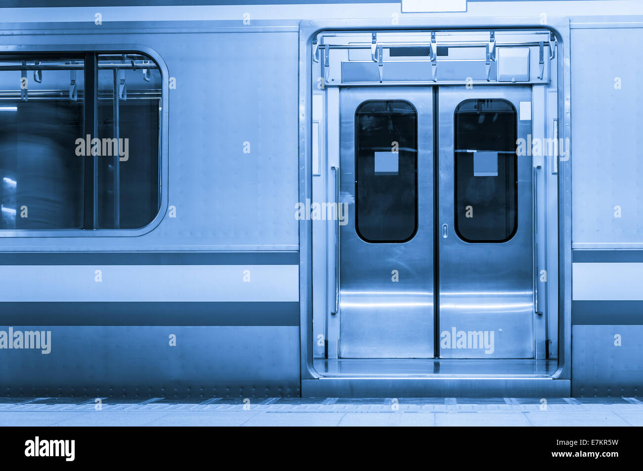 Toned blue image of the Tokyo Metro. Stock Photo