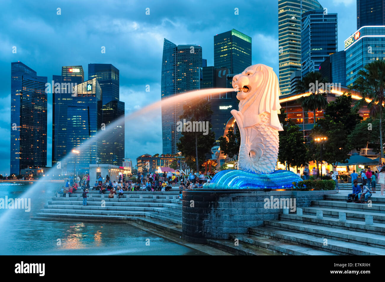The Merlion of Singapore lit up in early evening. Stock Photo