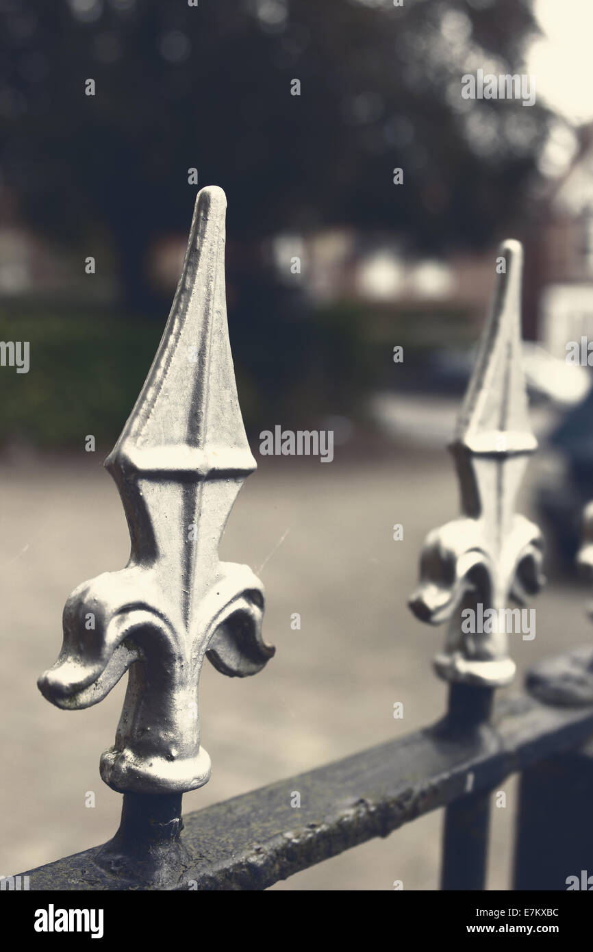 Trident shaped wrought iron fence top Stock Photo Alamy