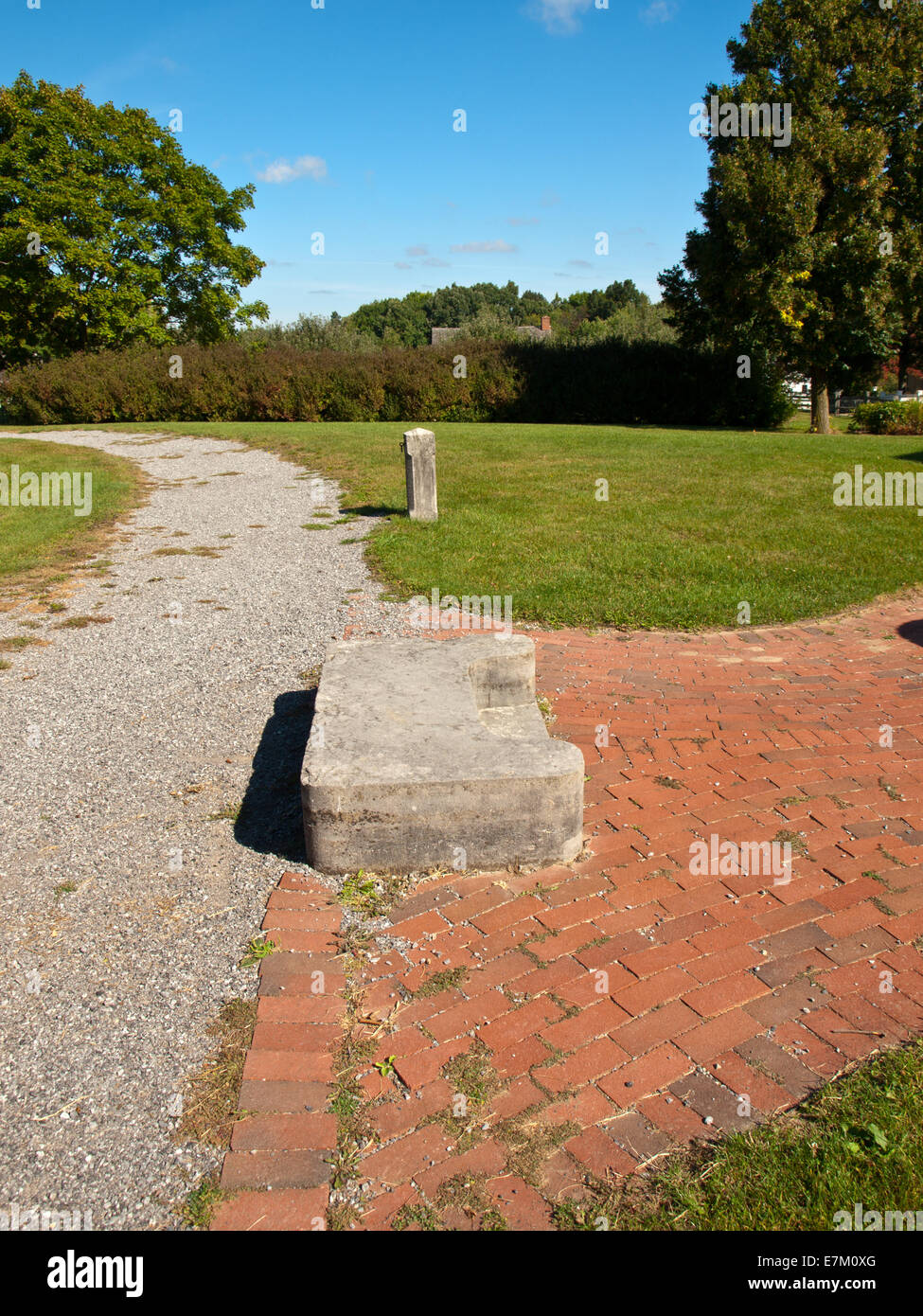 old fashioned cement step for help mounting horses Stock Photo