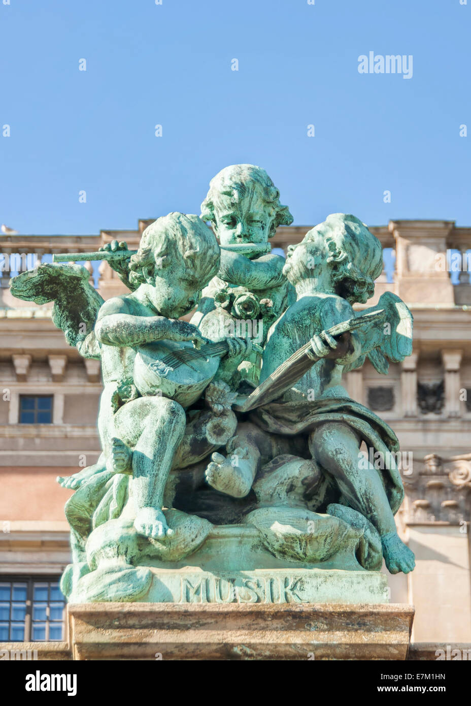 Statue to celebrate Music at the fence in front of the royal palace in Stockholm. Stock Photo