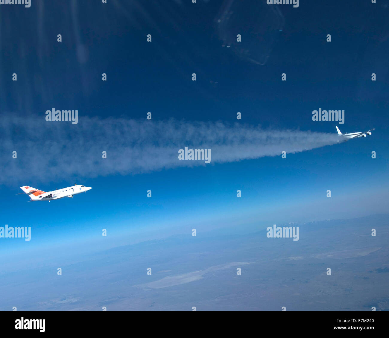 emissions and contrail formation of burning alternative fuels in jet engines Stock Photo