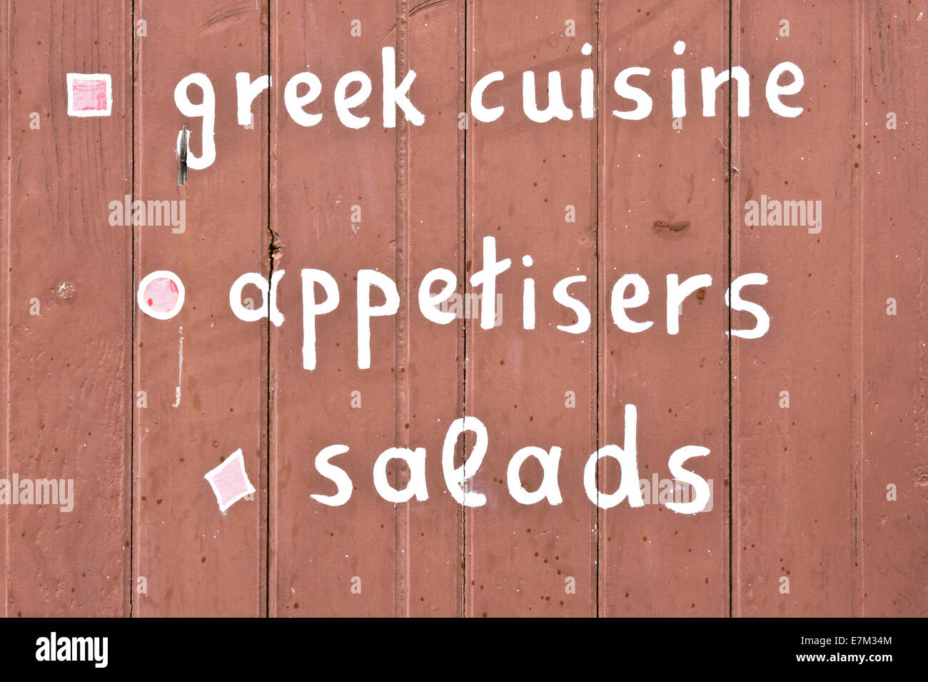 Close up of a sign at a greek restaurant Stock Photo