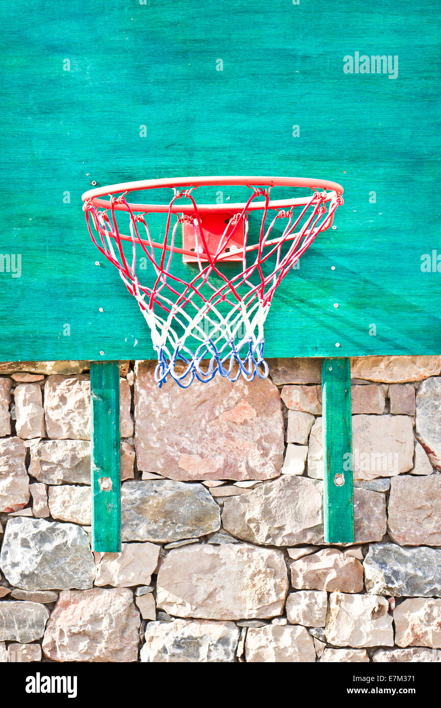 A basketball net on a green board Stock Photo
