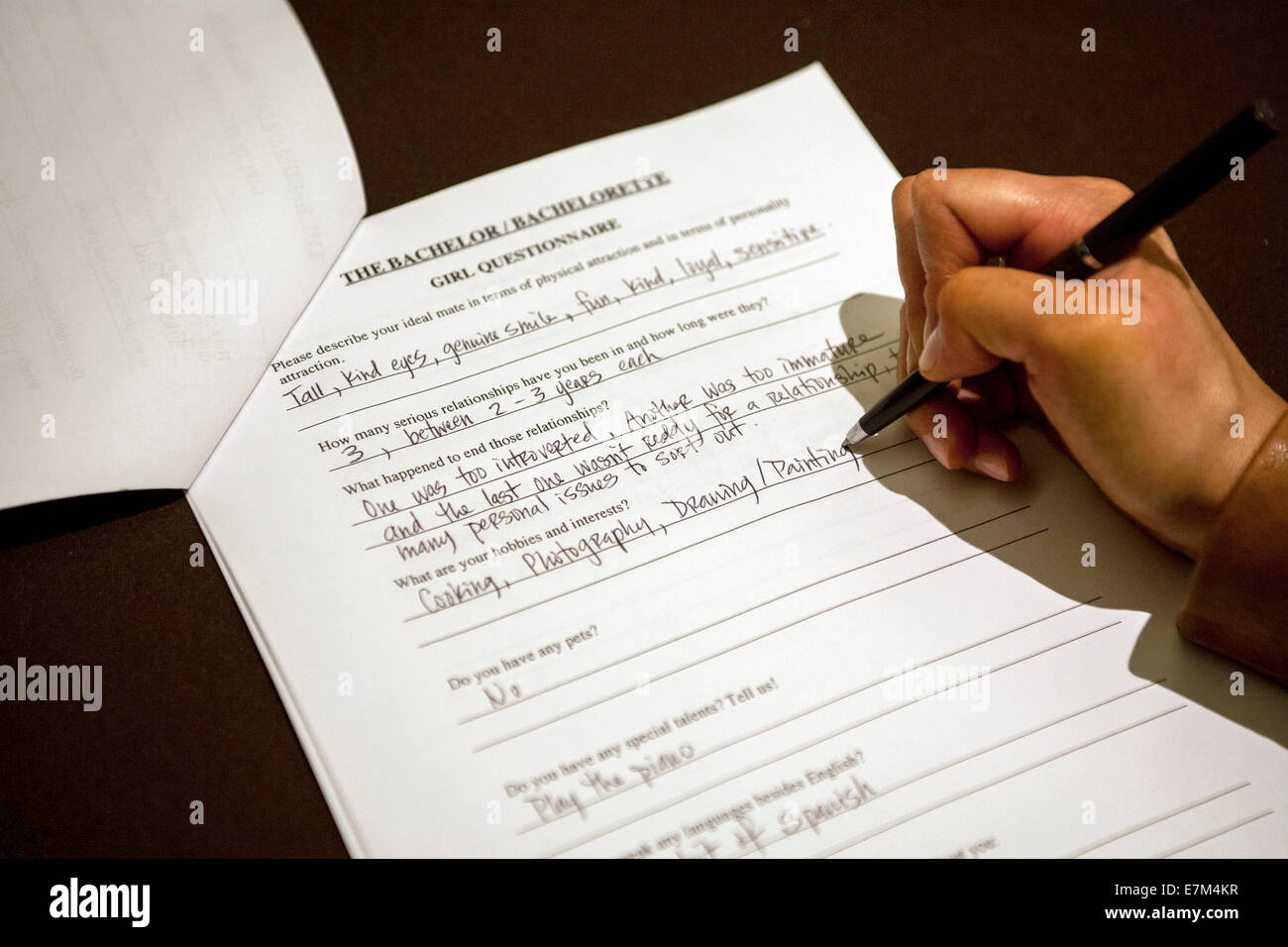 A 'Bachelor/Bachelorette' questionnaire asks about past relationships at a casting call in Costa Mesa, CA, for 'The Bachelor' TV show. Note question about hobbies. Stock Photo