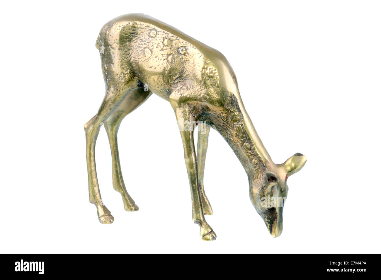Bronze deer doe figurine isolated on a white background Stock Photo