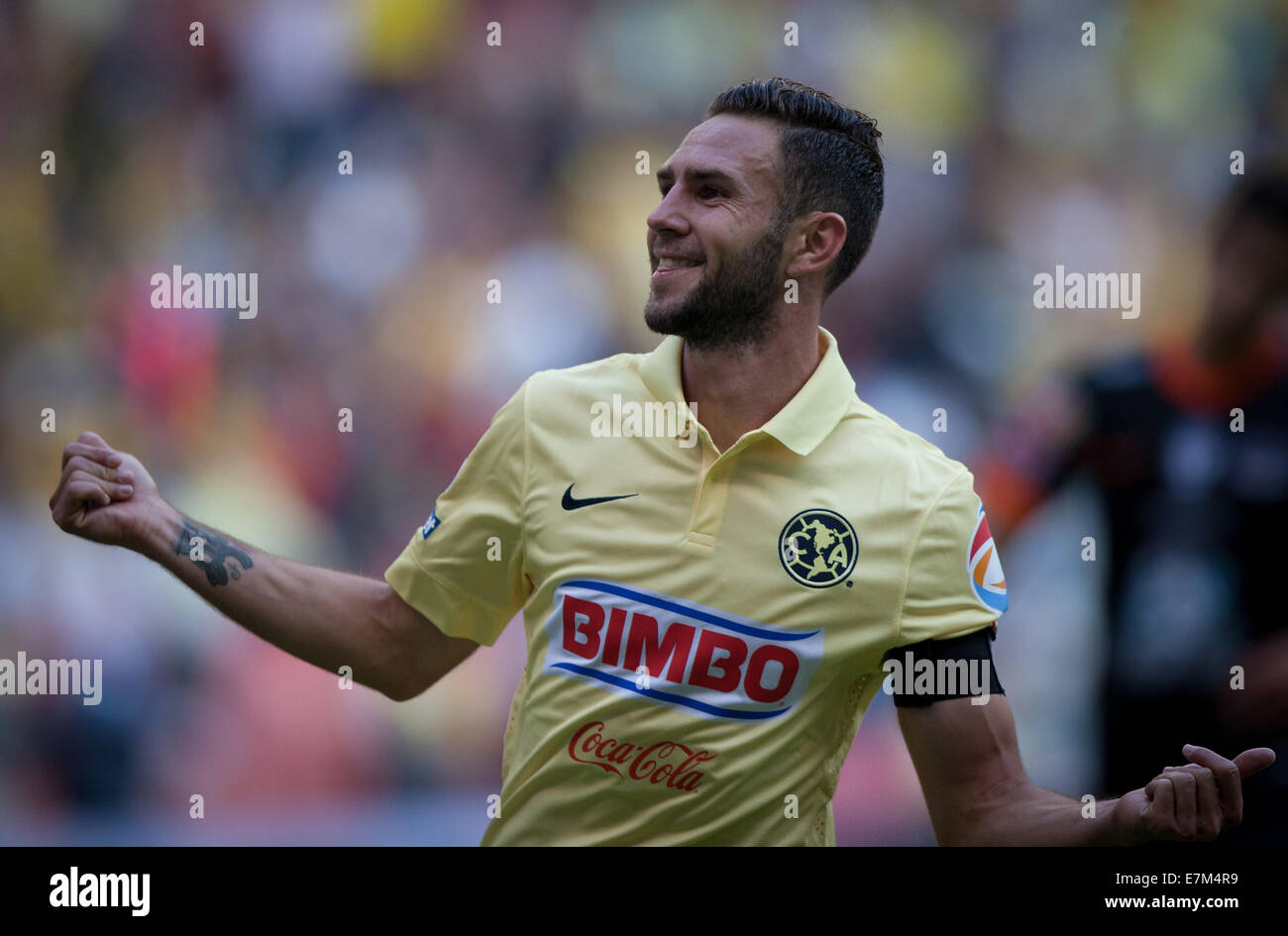Mexico City, Mexico. 20th Sep, 2014. Miguel Layun of America celebrates after scoring during the Liga MX soccer match of the Opening Tournament 2014, against Pachuca, held at Azteca Stadium, in Mexico City, Mexico, on Sept. 20, 2014. Credit:  Pedro Mera/Xinhua/Alamy Live News Stock Photo