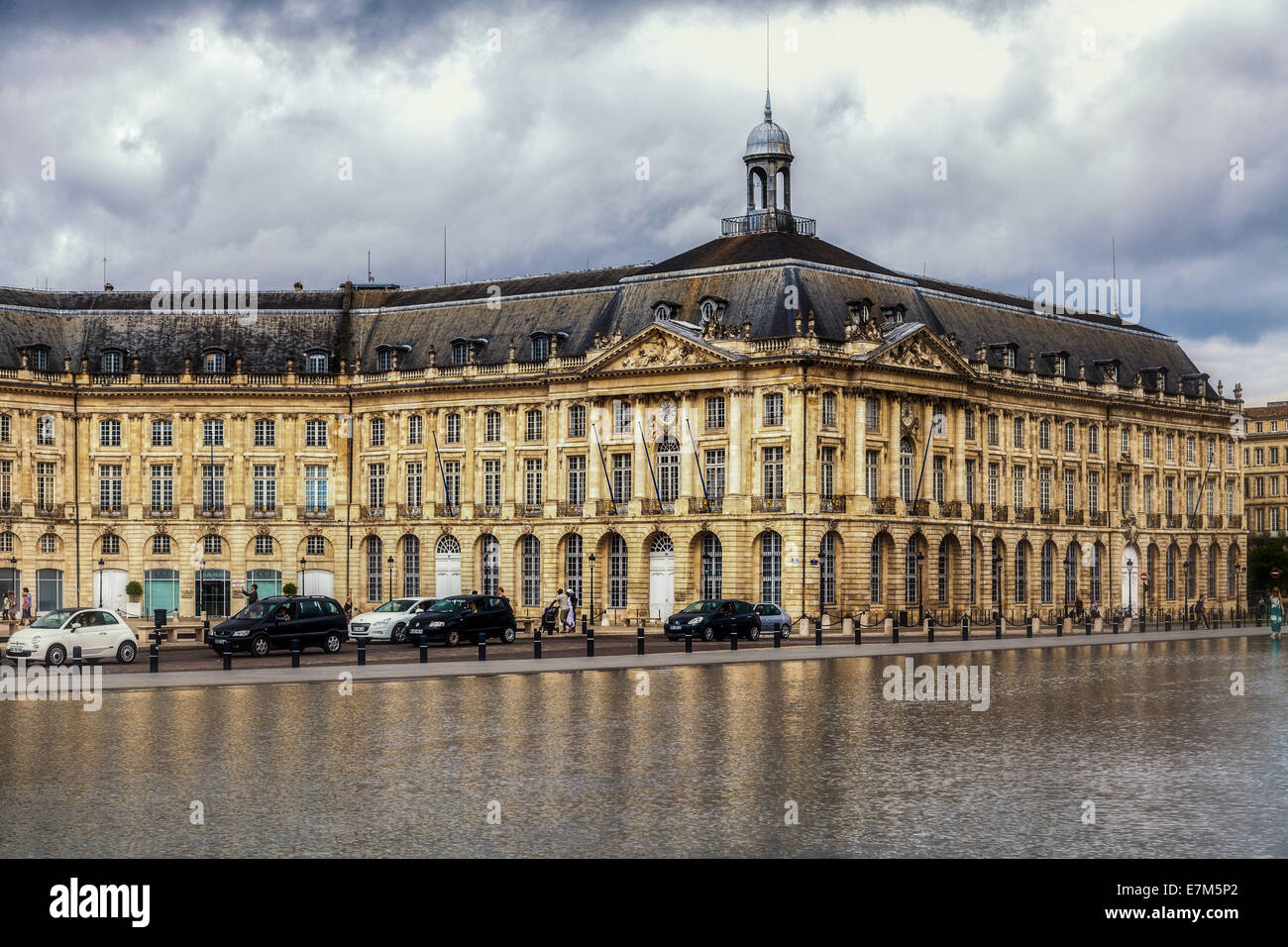 The historic architecture is reflected in the Water Mirror in Bordeaux France Stock Photo