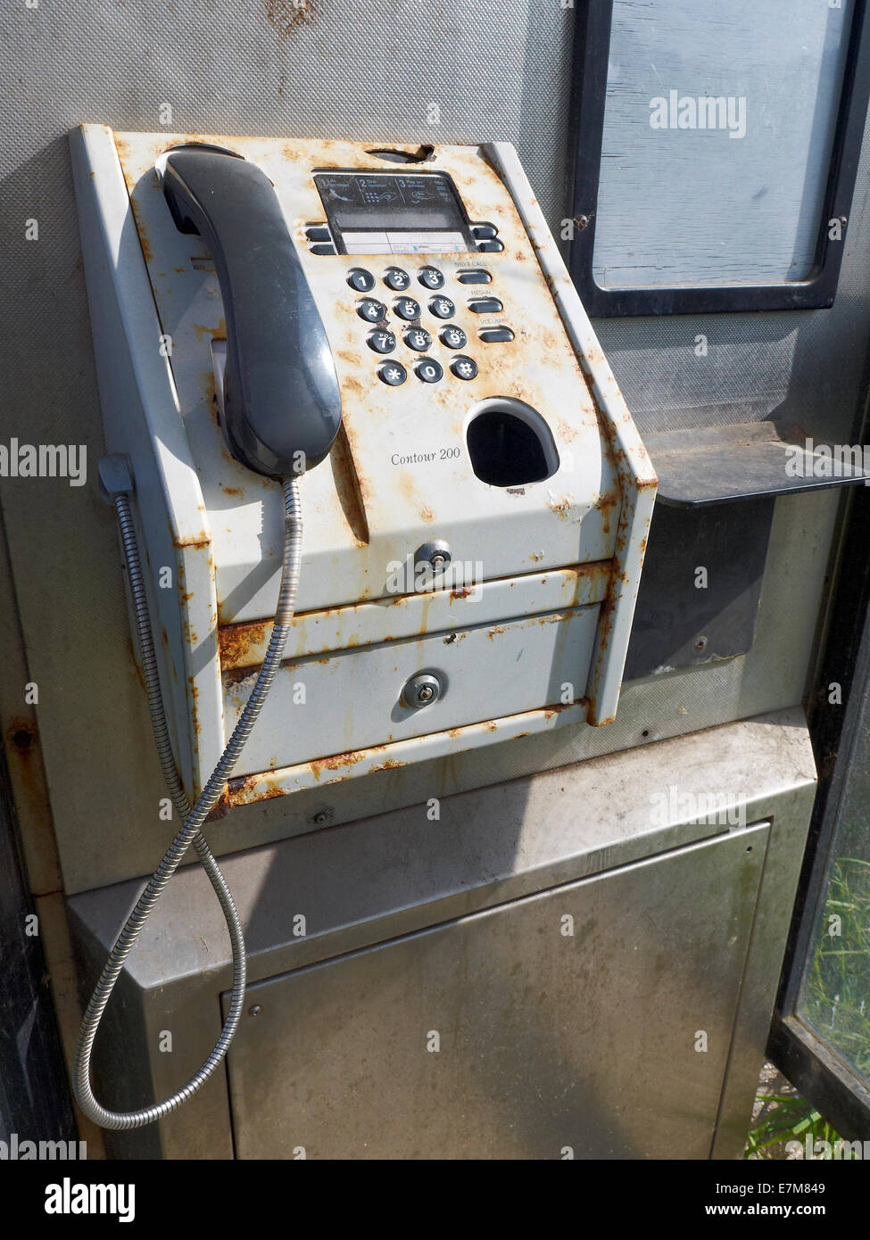 Rusty telephone replaced by mobile phones UK Stock Photo Alamy