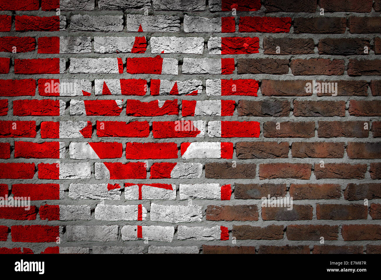 Dark brick wall texture - flag painted on wall - Canada Stock Photo - Alamy