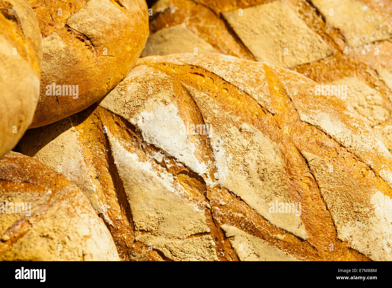 Traditional Rye many rustic baked traditional rye bread loaves on a market stall ...