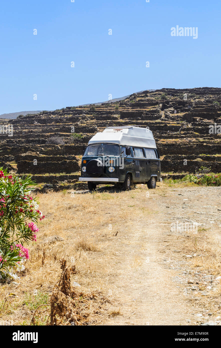 A Volkswagen Type 2 Camper Van in the village of Pyrgos, Tinos Island, Cyclades, Greece Stock Photo
