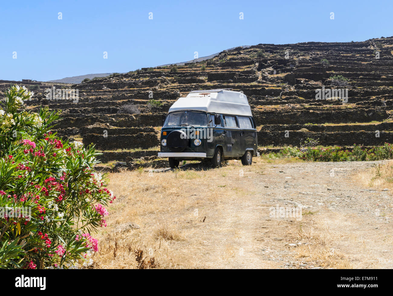 A Volkswagen Type 2 Camper Van in the village of Pyrgos, Tinos Island, Cyclades, Greece Stock Photo