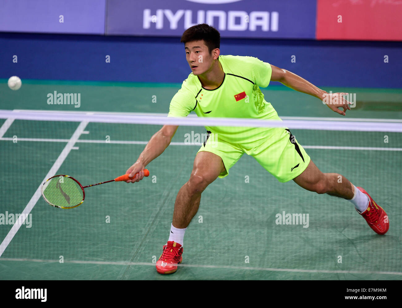 Incheon, South Korea. 21st Sep, 2014. Chen Long of China returns the ...