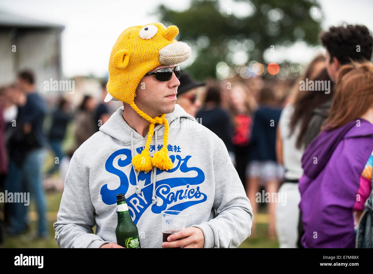 A festivalgoer wearing a silly hat at the Brentwood Festival. Stock Photo
