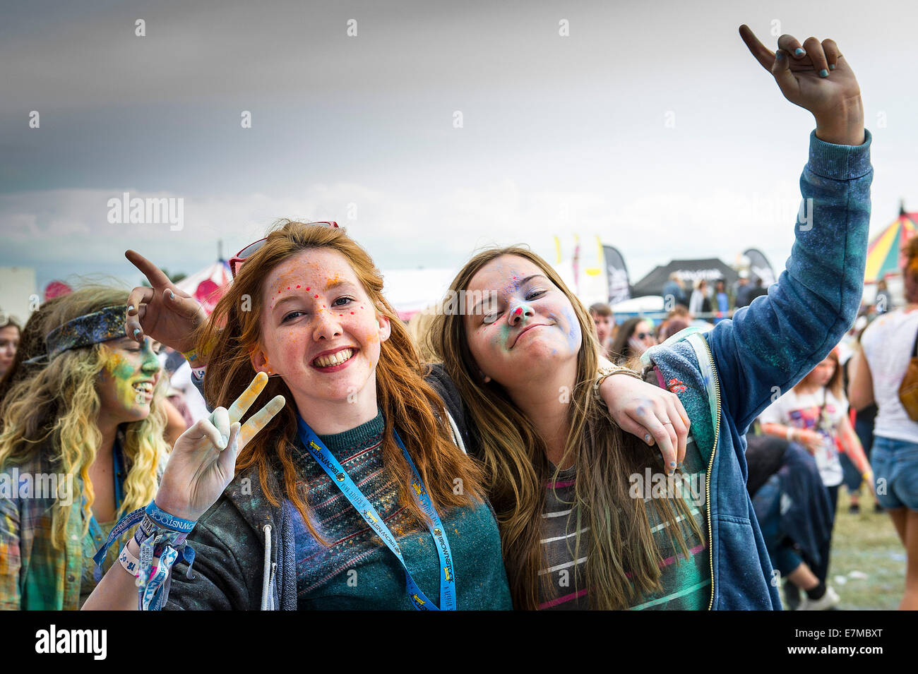 Festivalgoers covered in paint at the Brownstock Festival in Essex. Stock Photo
