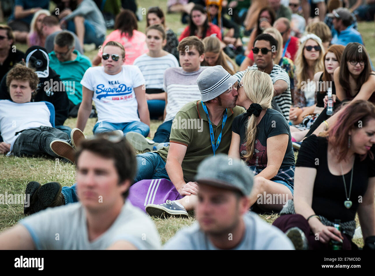 Festivalgoers kissing at the Brownstock Festival in Essex. Stock Photo