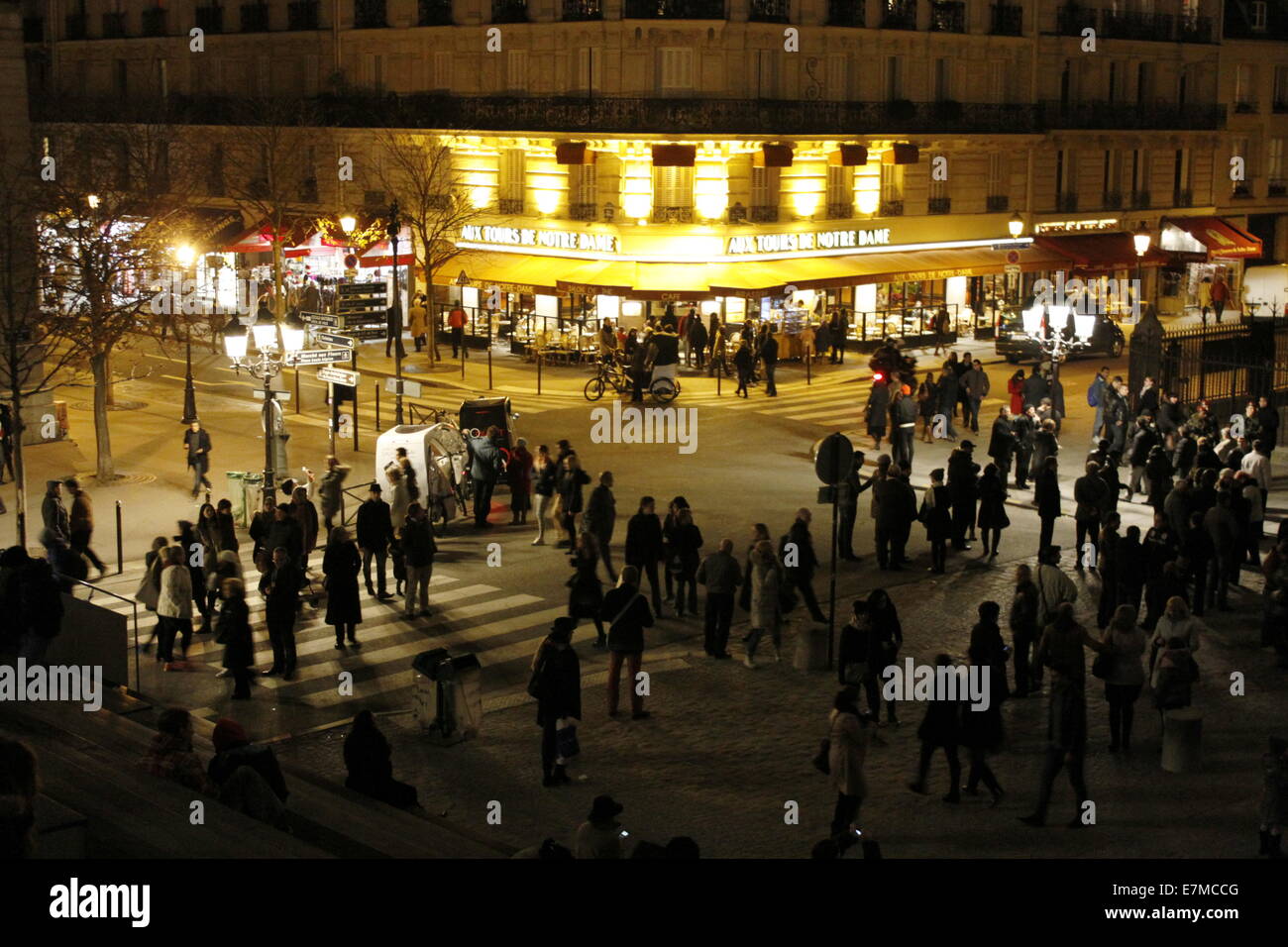 Street scene by night in the city of Paris near Notre-Dame de Paris cathedral, french capital, Ile-de-France, France. Stock Photo