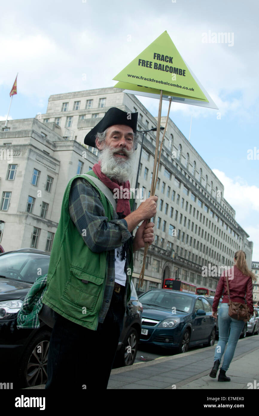 Westminster, London, UK. 21st September 2014 A protester with an anti fracking placard at the people's climate march in Londpn Credit:  amer ghazzal/Alamy Live News Stock Photo