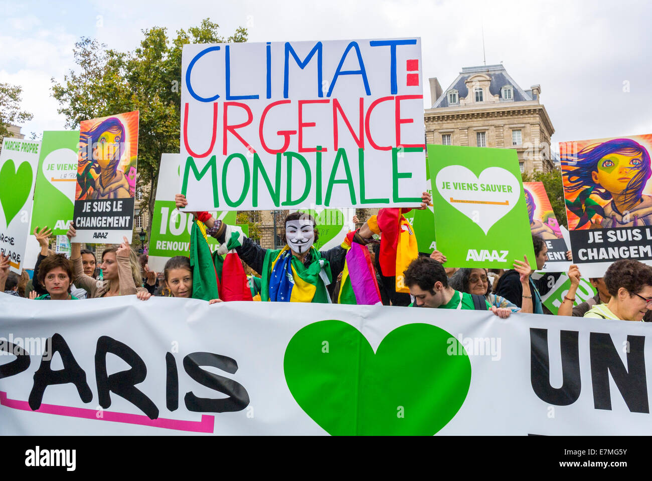 Paris, France. Crowd Holding French activist protest poster and Banners at  Public Demonstration, International Climate Change (Avaaz) people march street, climate protest sign, france ecology demonstration activism france, global problem, eco protests Stock Photo