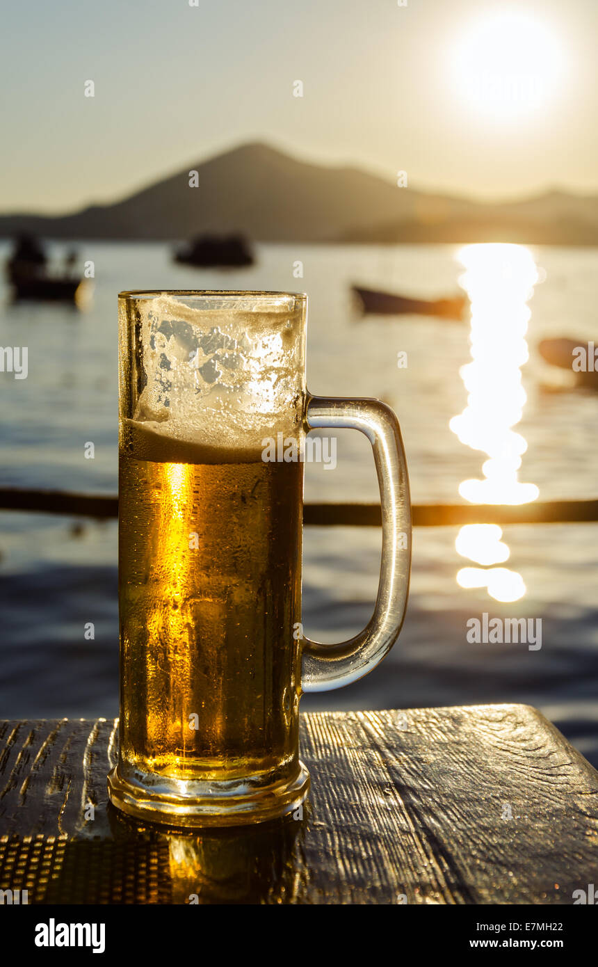 Download Glass Of Cold Beer At Sunset Stock Photo Alamy Yellowimages Mockups