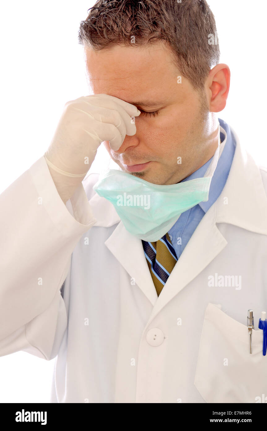 Overworked and tired Doctor on the white background Stock Photo