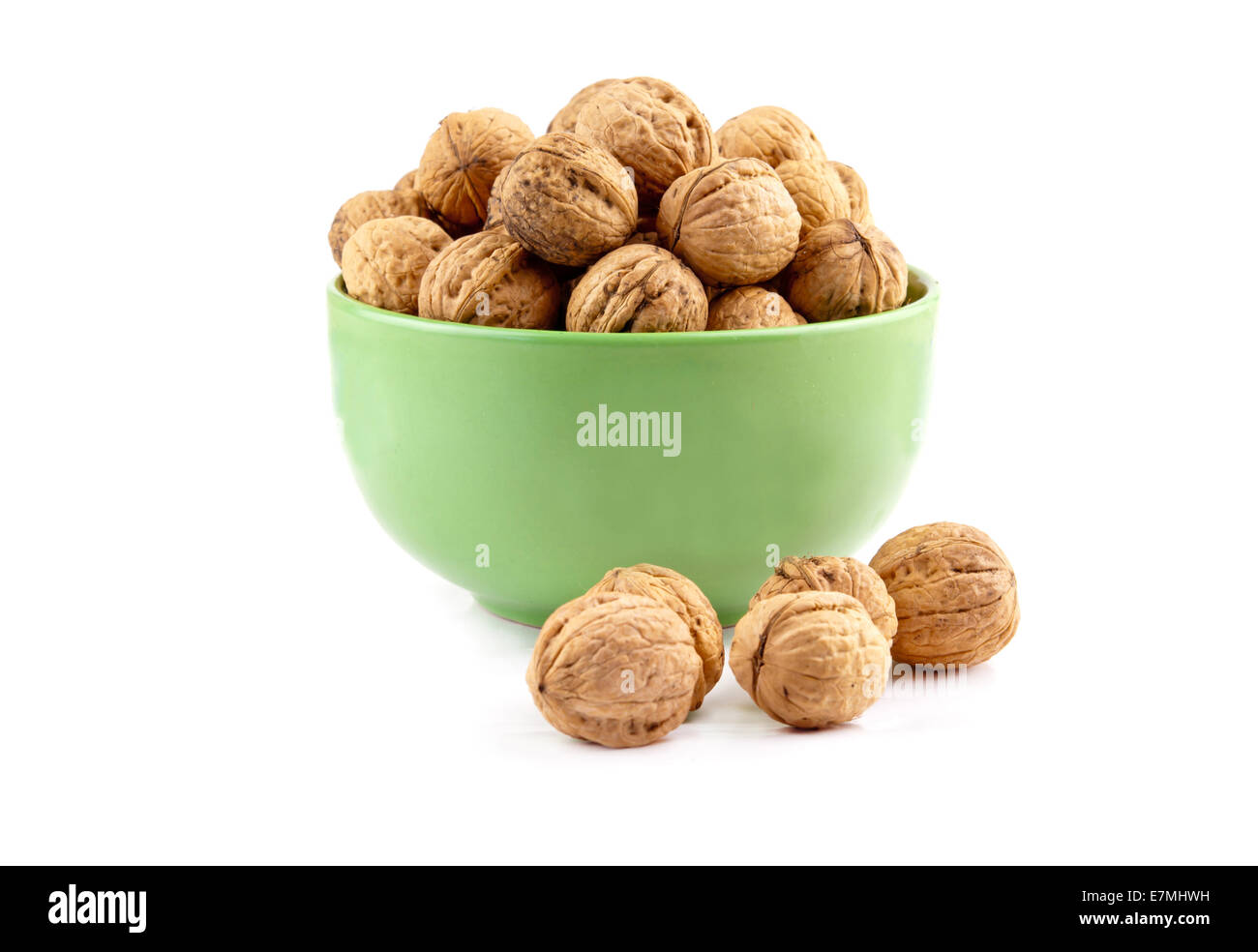 walnuts in dish on a white background Stock Photo