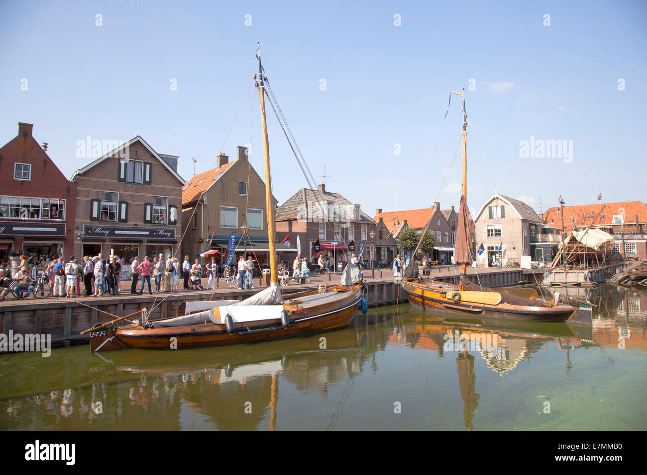 old dutch sailing vessels in the harbor of Spakenburg in the Netherlands Stock Photo
