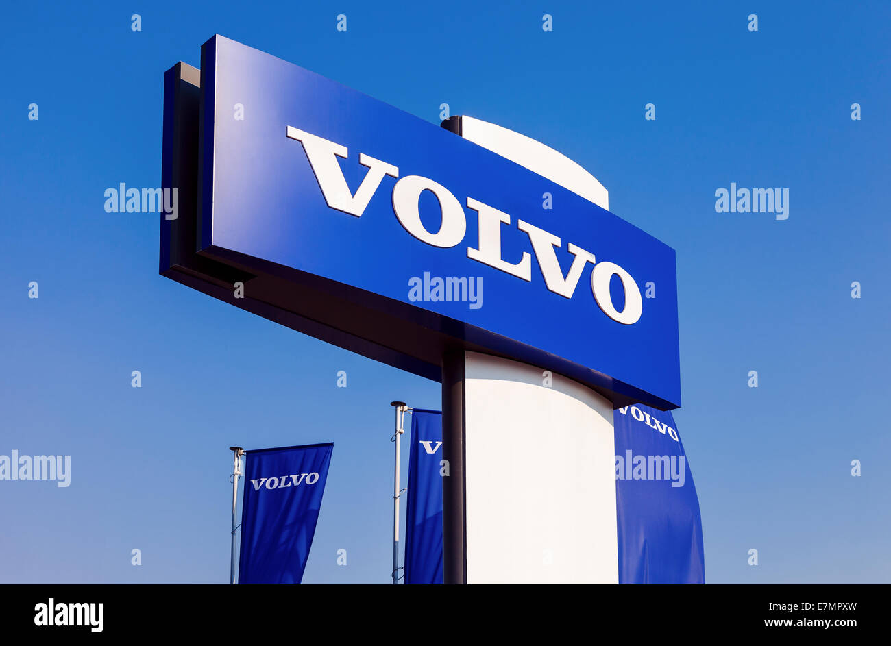 Volvo dealership sign against blue sky Stock Photo Alamy