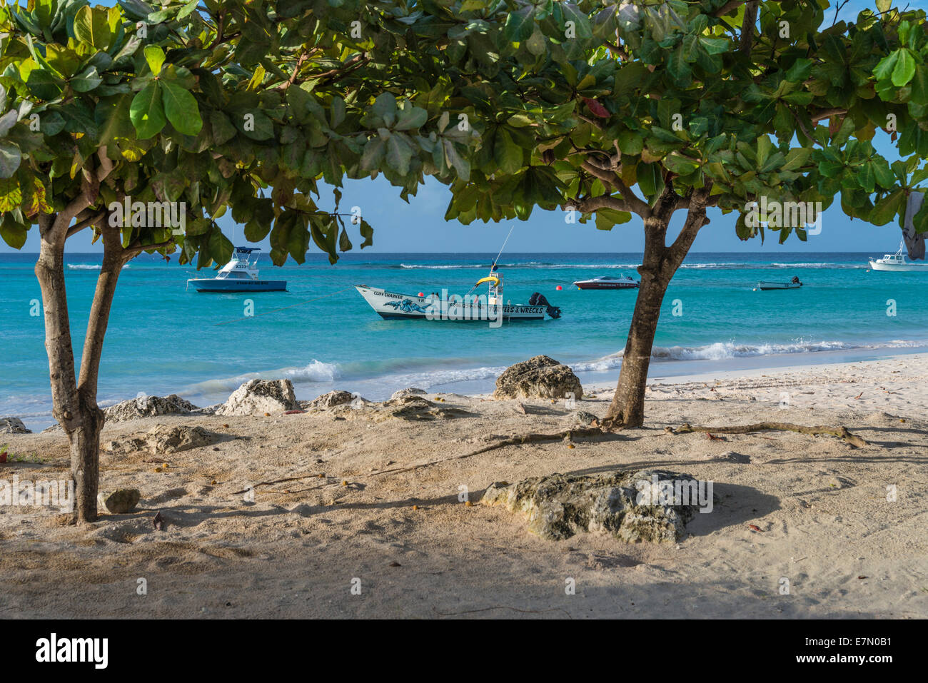 Boats moored off Worthing Beach, Barbados Stock Photo