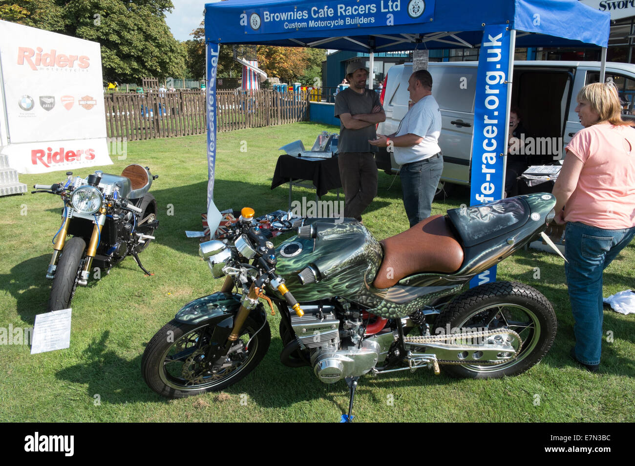 Yeovilton, Somerset, UK. 21st Sep, 2014. Motorbike village trade stands on lawn area. A 1977 Suzuki GT550 Cafe Racer Custom built motorbike. Credit:  Paul Quayle/Alamy Live News Stock Photo