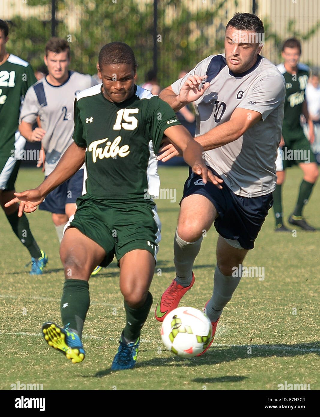 Washington, DC, USA. 21st Sep, 2014. William \u0026 Mary midfielder Marcus  Luster (15) defends against Georgetown forward Brandon Allen (10) in the  first half of an NCAA men's soccer match at Shaw, image size:1067x1390
