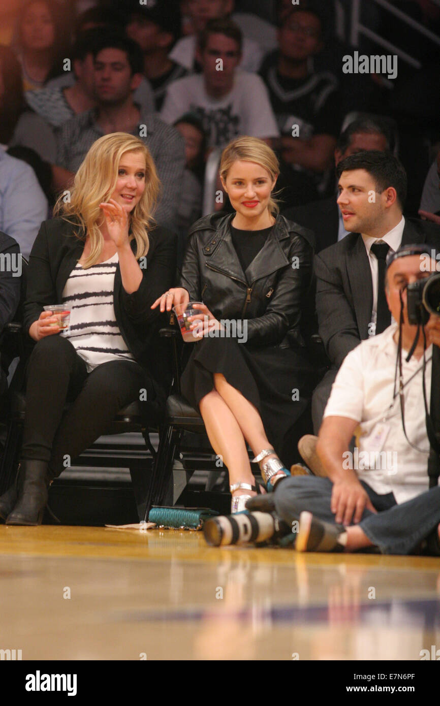 Laker fan Mario Lopez sits courtside at a Laker game.jpg