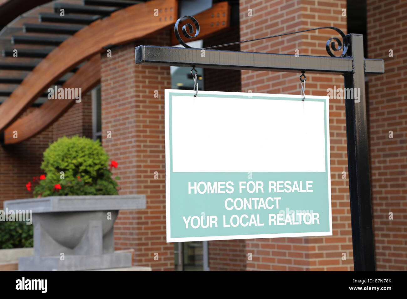 Coquitlam, BC Canada - August 24, 2014 : Empty sign for your ad with building background in Coquitlam BC Canada. Stock Photo