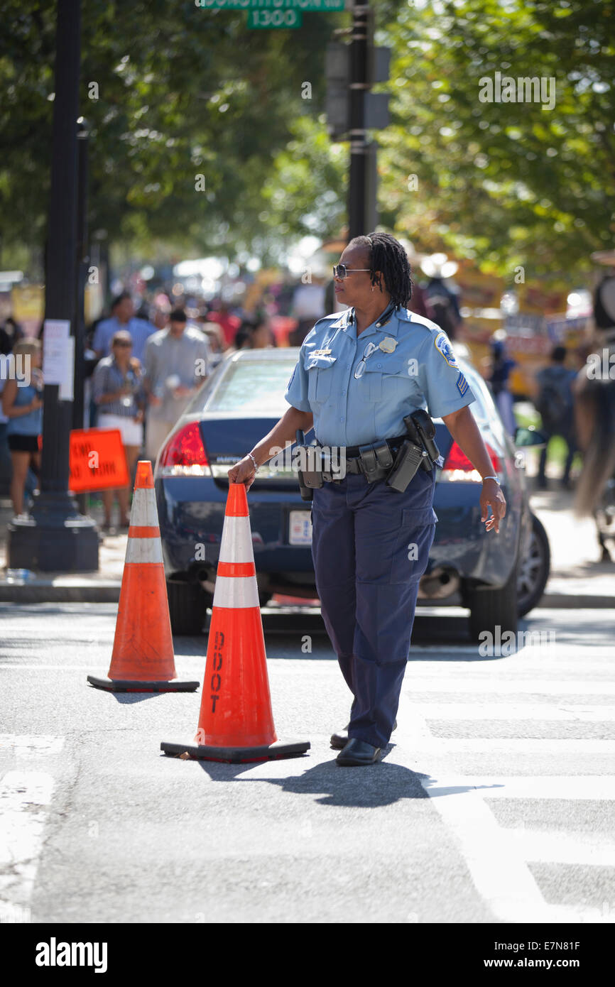 Policewoman directing traffic - Washington, DC USA Stock Photo