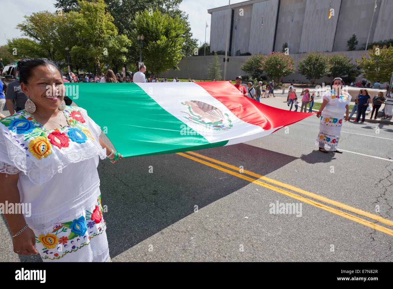 Latin Festival participants holding Mexican flag - Washington, DC USA Stock Photo