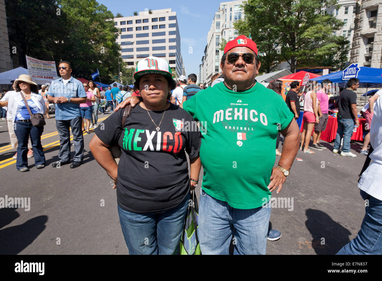 Couple wearing Mexico t-shirts at outdoor festival - USA Stock Photo