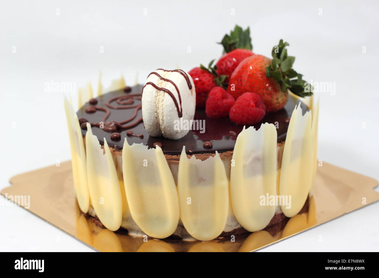 Dark chocolate strawberry cake on white background Stock Photo - Alamy
